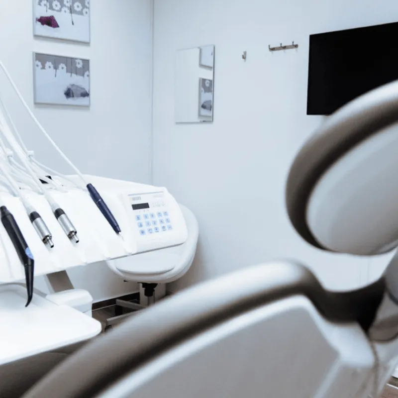 Generic Dental office imagery. Dental chair and instruments.